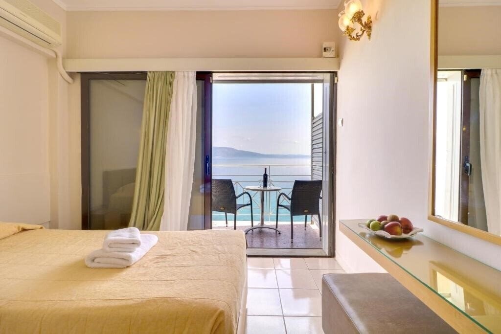 Фото Calamos Beach Family Club 3*